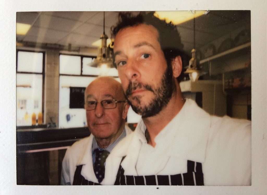 Paul and Matthew Coleman in the butcher shop